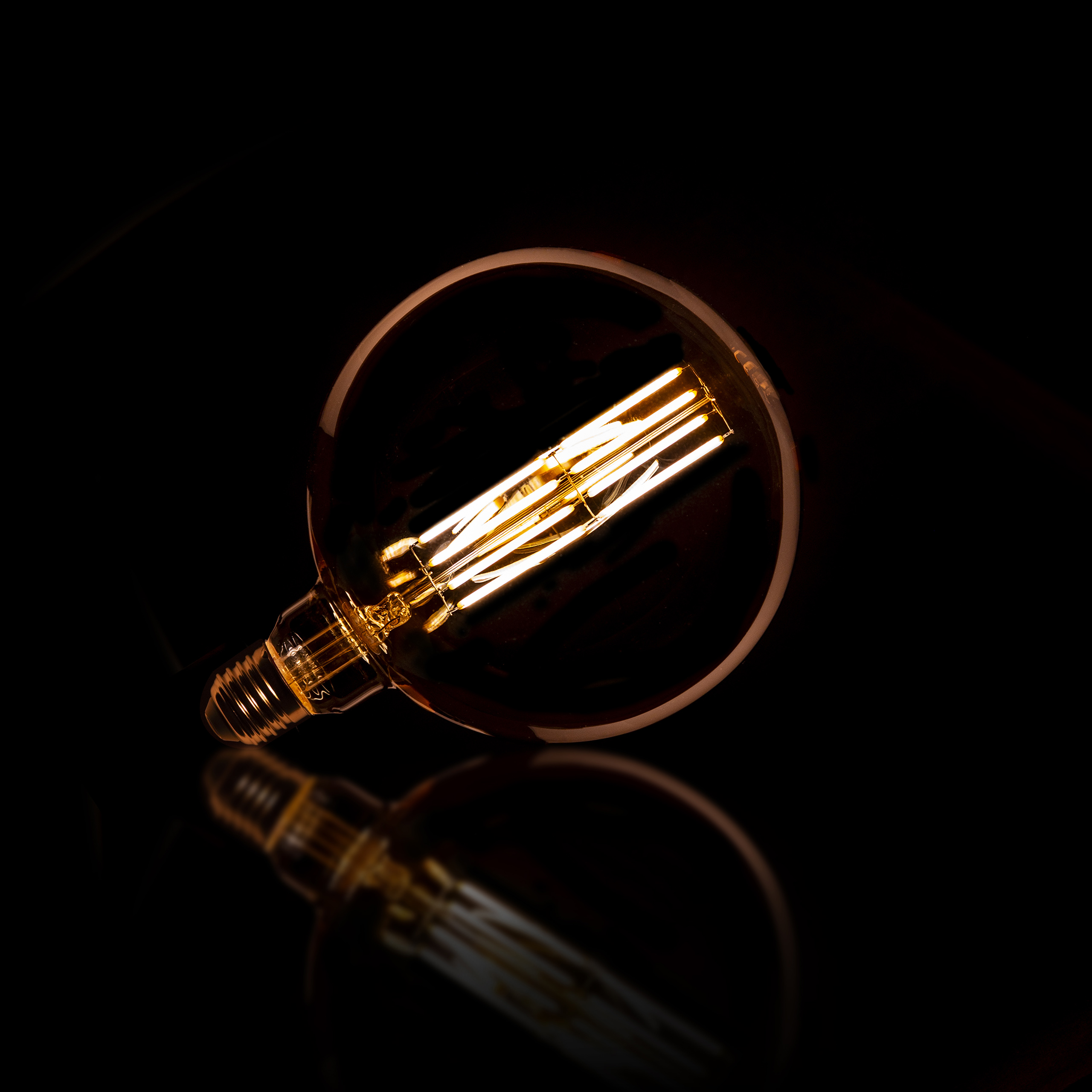 Fuente de luz LED [G150] bola de filamento Ø15 / Vidrio ámbar